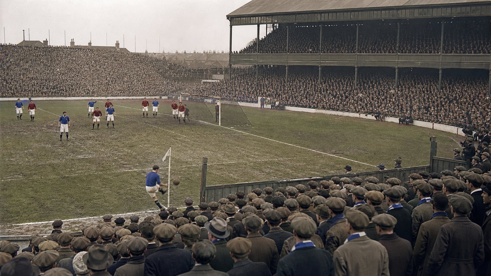 A packed 1928 Goodison Park watches Dixie Dean attack a corner against Arsenal